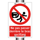 Ne pas passer derrière le bras oscillant