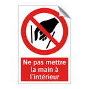 Ne pas mettre la main à l'intérieur