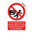 Il est interdit de se trouver dans la zone de fonctionnement de la machine.