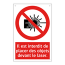 Il est interdit de placer des objets devant le laser.
