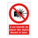 Il est interdit de placer des objets devant le laser.