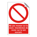 Ne pas monter sur le store. Interdiction de rester sur le toit ouvrant.