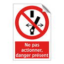 Ne pas actionner, danger présent