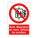 Arrêt. Réparation en cours. Utilisez les escaliers