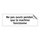Ne pas ouvrir pendant que la machine fonctionne
