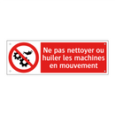 Ne pas nettoyer ou huiler les machines en mouvement