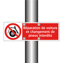 Réparation de voiture et changement de pneus interdits