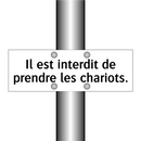 Il est interdit de prendre les chariots.