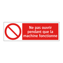 Ne pas ouvrir pendant que la machine fonctionne
