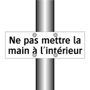 Ne pas mettre la main à l'intérieur