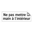 Ne pas mettre la main à l'intérieur