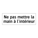 Ne pas mettre la main à l'intérieur