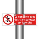 La conduite avec des transpalettes est interdite
