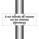 Il est interdit de monter sur les chariots élévateurs