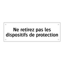 Ne retirez pas les dispositifs de protection