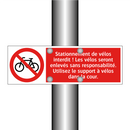 Stationnement de vélos interdit ! Les vélos seront enlevés sans responsabilité. Utilisez le support à vélos dans la cour.
