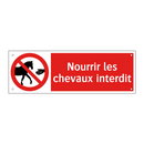 Nourrir les chevaux interdit
