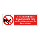 Il est interdit de se trouver dans la zone de fonctionnement de la machine.