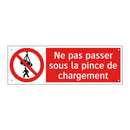 Ne pas passer sous la pince de chargement