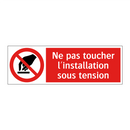 Ne pas toucher l'installation sous tension