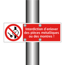 Interdiction d'enlever des pièces métalliques ou des montres !