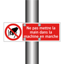 Ne pas mettre la main dans la machine en marche