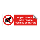 Ne pas mettre la main dans la machine en marche