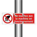 Ne touchez pas la machine en fonctionnement