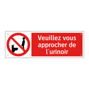 Veuillez vous approcher de l'urinoir