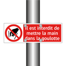 Il est interdit de mettre la main dans la goulotte