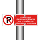 Les places de stationnement jaunes sont réservées aux voitures avec remorques.