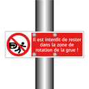 Il est interdit de rester dans la zone de rotation de la grue !