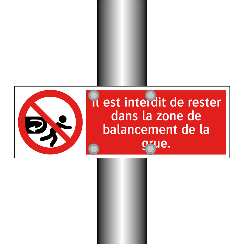 Il est interdit de rester dans la zone de balancement de la grue.