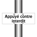 Appuyé contre interdit