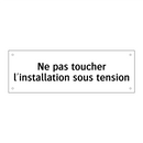 Ne pas toucher l'installation sous tension