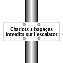 Chariots à bagages interdits sur l'escalator