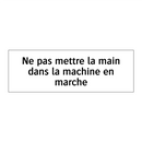 Ne pas mettre la main dans la machine en marche