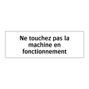 Ne touchez pas la machine en fonctionnement