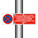 Veuillez garder l'entrée et la sortie dégagées ! Les véhicules stationnés illégalement seront remorqués moyennant des frais !