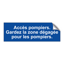 Accès pompiers. Gardez la zone dégagée pour les pompiers.
