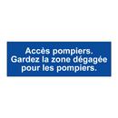Accès pompiers. Gardez la zone dégagée pour les pompiers.