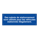 Des sabots de stationnement sont utilisés pour les véhicules stationnés illégalement.