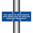 Des sabots de stationnement sont utilisés pour les véhicules stationnés illégalement.