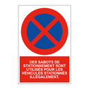 Des sabots de stationnement sont utilisés pour les véhicules stationnés illégalement.