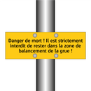 Danger de mort ! Il est strictement interdit de rester dans la zone de balancement de la grue !