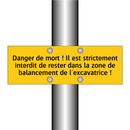 Danger de mort ! Il est strictement interdit de rester dans la zone de balancement de l'excavatrice !