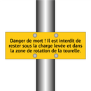 Danger de mort ! Il est interdit de rester sous la charge levée et dans la zone de rotation de la tourelle