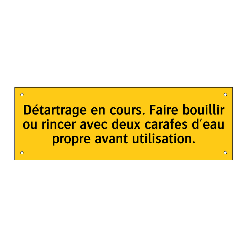 Détartrage en cours. Faire bouillir ou rincer avec deux carafes d'eau propre avant utilisation