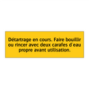 Détartrage en cours. Faire bouillir ou rincer avec deux carafes d'eau propre avant utilisation