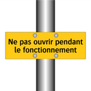 Ne pas ouvrir pendant le fonctionnement